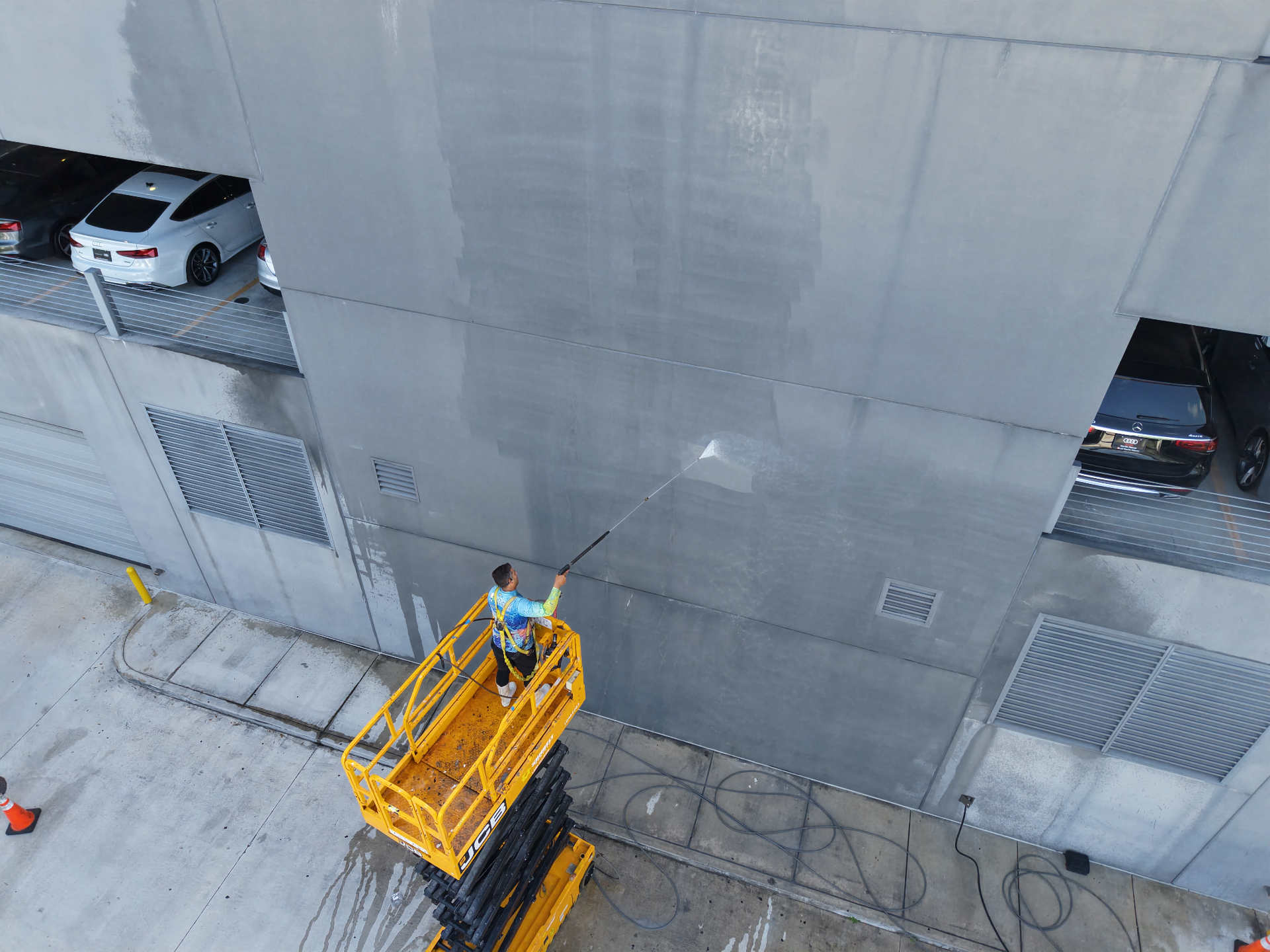 Cleaning multi-level parking structure exterior wall in Hialeah FL